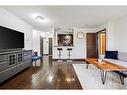 5310-27 Grier Place Ne, Calgary, AB  - Indoor Photo Showing Living Room 