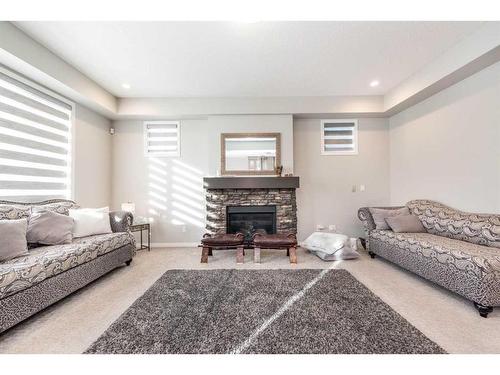 59 Cityside Common Ne, Calgary, AB - Indoor With Fireplace