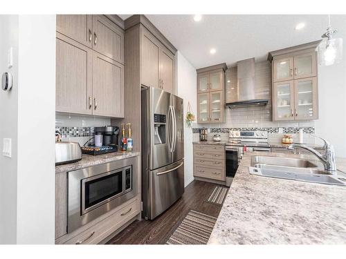 59 Cityside Common Ne, Calgary, AB - Indoor Photo Showing Kitchen With Double Sink With Upgraded Kitchen