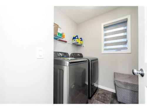 59 Cityside Common Ne, Calgary, AB - Indoor Photo Showing Laundry Room