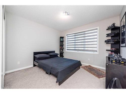 59 Cityside Common Ne, Calgary, AB - Indoor Photo Showing Bedroom