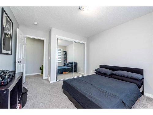 59 Cityside Common Ne, Calgary, AB - Indoor Photo Showing Bedroom