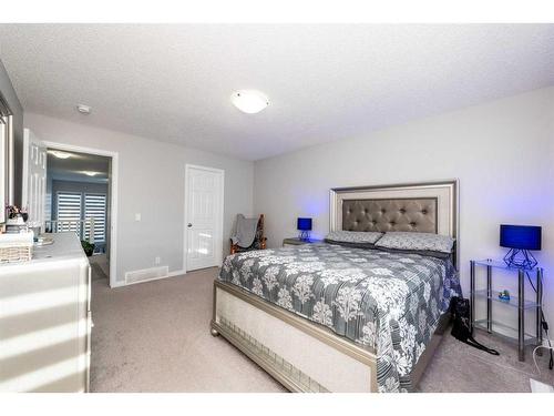 59 Cityside Common Ne, Calgary, AB - Indoor Photo Showing Bedroom