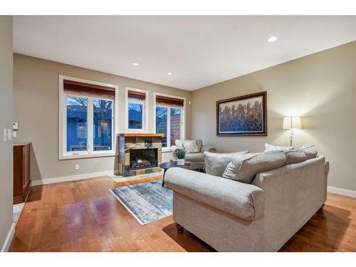 236 23 Avenue Nw, Calgary, AB - Indoor Photo Showing Living Room With Fireplace