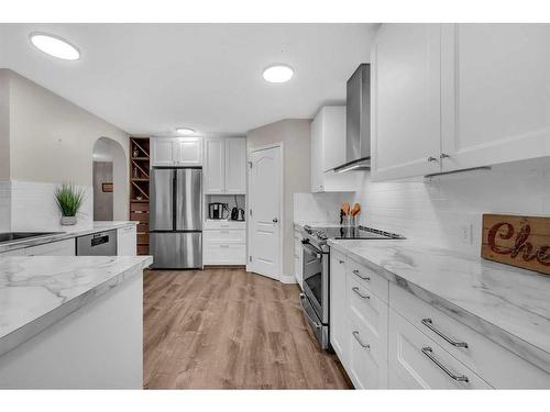 132 Springmere Grove, Chestermere, AB - Indoor Photo Showing Kitchen With Stainless Steel Kitchen With Upgraded Kitchen