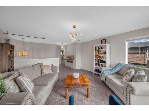 132 Springmere Grove, Chestermere, AB - Indoor Photo Showing Living Room