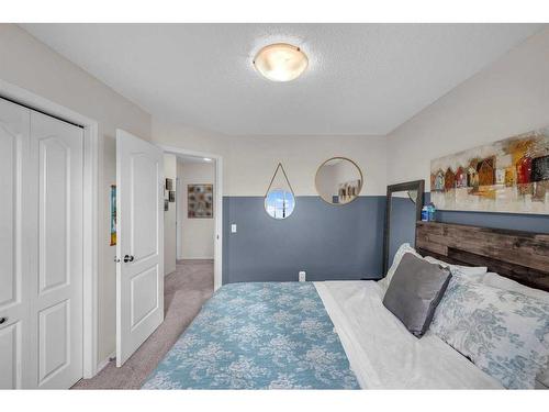 132 Springmere Grove, Chestermere, AB - Indoor Photo Showing Bedroom