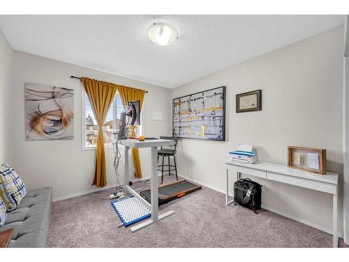 132 Springmere Grove, Chestermere, AB - Indoor Photo Showing Gym Room