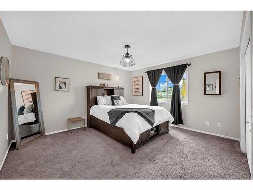 132 Springmere Grove, Chestermere, AB - Indoor Photo Showing Bedroom