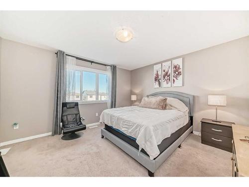 60 Reunion Loop Nw, Airdrie, AB - Indoor Photo Showing Bedroom