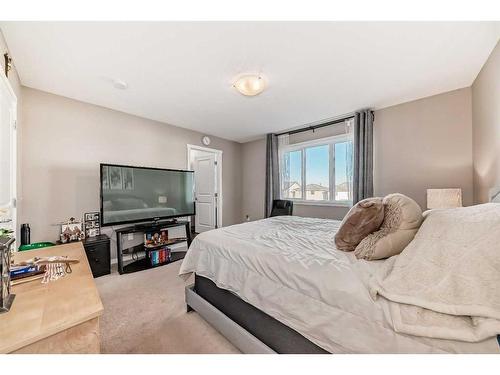 60 Reunion Loop Nw, Airdrie, AB - Indoor Photo Showing Bedroom