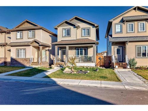 60 Reunion Loop Nw, Airdrie, AB - Outdoor With Deck Patio Veranda With Facade