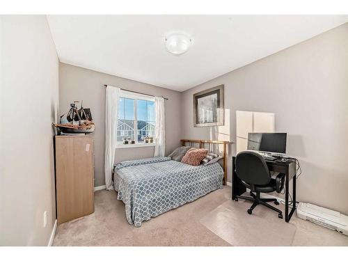 60 Reunion Loop Nw, Airdrie, AB - Indoor Photo Showing Bedroom