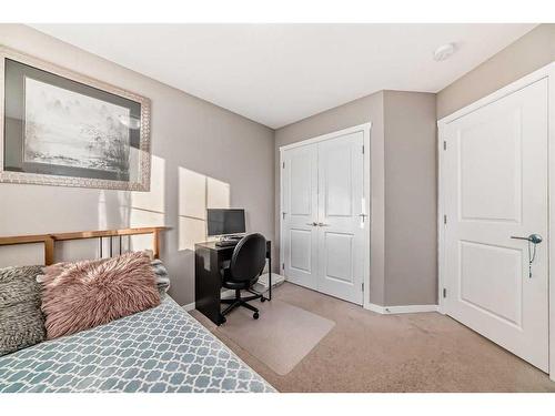 60 Reunion Loop Nw, Airdrie, AB - Indoor Photo Showing Bedroom