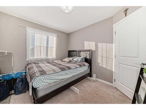 60 Reunion Loop Nw, Airdrie, AB - Indoor Photo Showing Bedroom