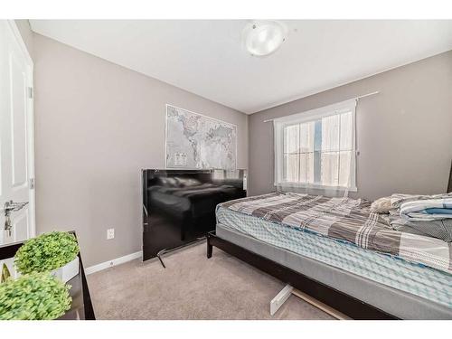 60 Reunion Loop Nw, Airdrie, AB - Indoor Photo Showing Bedroom