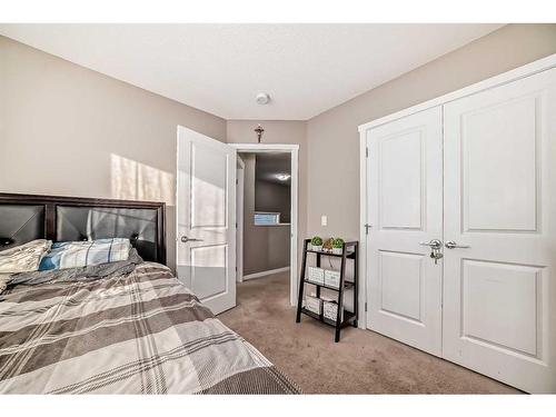 60 Reunion Loop Nw, Airdrie, AB - Indoor Photo Showing Bedroom