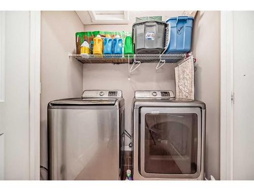 60 Reunion Loop Nw, Airdrie, AB - Indoor Photo Showing Laundry Room