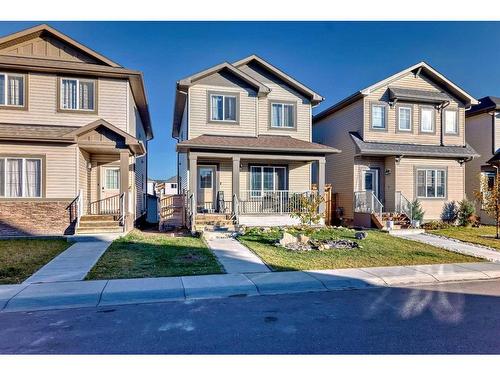 60 Reunion Loop Nw, Airdrie, AB - Outdoor With Deck Patio Veranda With Facade