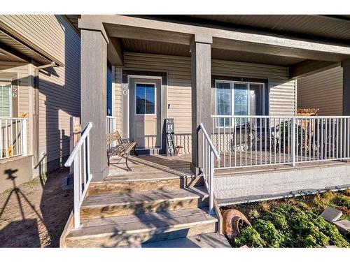 60 Reunion Loop Nw, Airdrie, AB - Outdoor With Deck Patio Veranda With Exterior