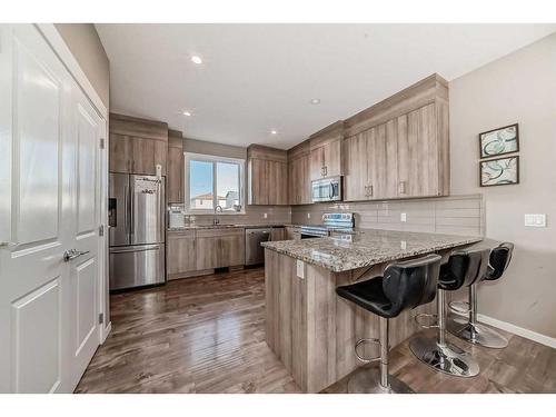 60 Reunion Loop Nw, Airdrie, AB - Indoor Photo Showing Kitchen