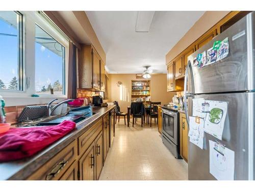 2211 43 Street Se, Calgary, AB - Indoor Photo Showing Kitchen With Double Sink