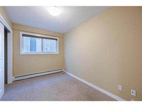 10-1715 13 Street Sw, Calgary, AB - Indoor Photo Showing Other Room