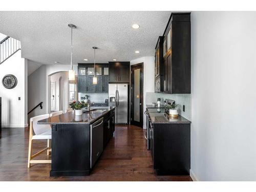 100 Cranridge Crescent Se, Calgary, AB - Indoor Photo Showing Kitchen With Upgraded Kitchen