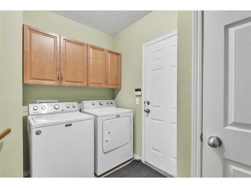 2 Canso Court Sw, Calgary, AB - Indoor Photo Showing Laundry Room