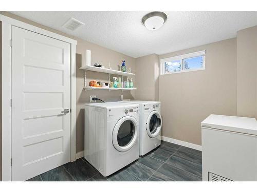 164 Havenhurst Crescent Sw, Calgary, AB - Indoor Photo Showing Laundry Room