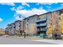 204-145 Burma Star Road Sw, Calgary, AB  - Outdoor With Balcony With Facade 