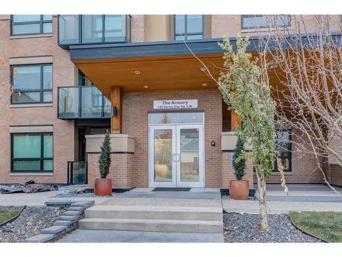 204-145 Burma Star Road Sw, Calgary, AB - Outdoor With Balcony With Facade