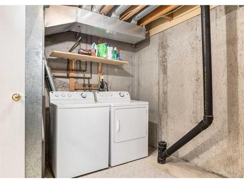 105-200 Shawnessy Drive Sw, Calgary, AB - Indoor Photo Showing Laundry Room