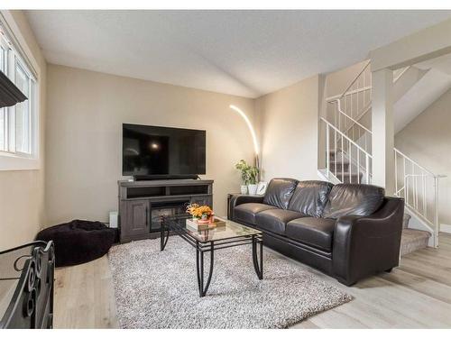 105-200 Shawnessy Drive Sw, Calgary, AB - Indoor Photo Showing Living Room