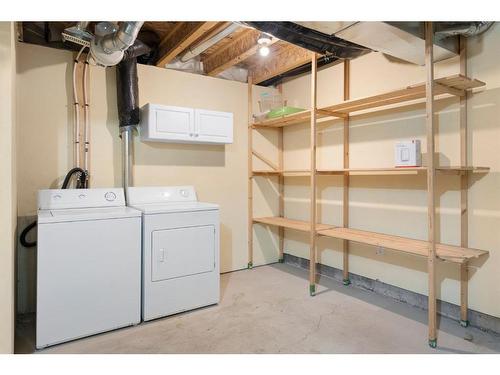 124 Promenade Way Se, Calgary, AB - Indoor Photo Showing Laundry Room