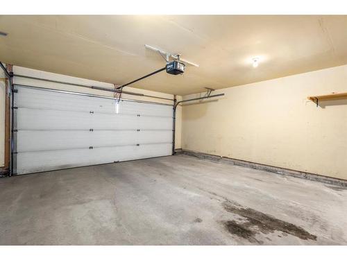 124 Promenade Way Se, Calgary, AB - Indoor Photo Showing Garage