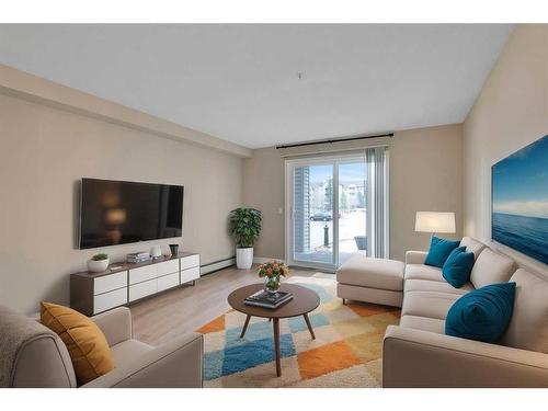 1106-604 8 Street Sw, Airdrie, AB - Indoor Photo Showing Living Room