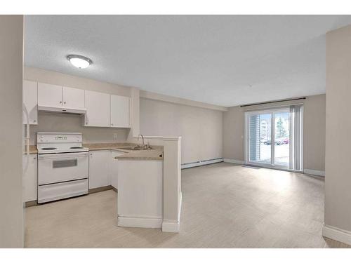 1106-604 8 Street Sw, Airdrie, AB - Indoor Photo Showing Kitchen