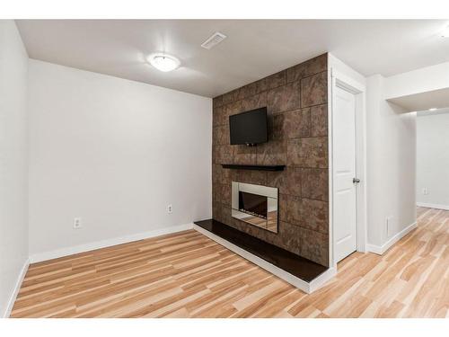 57-4769 Hubalta Road Se, Calgary, AB - Indoor With Fireplace