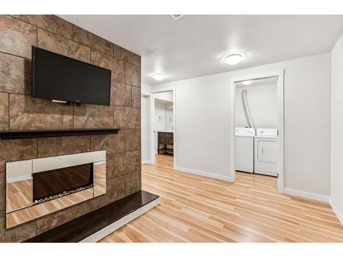 57-4769 Hubalta Road Se, Calgary, AB - Indoor With Fireplace