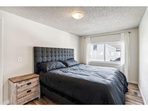 57-4769 Hubalta Road Se, Calgary, AB - Indoor Photo Showing Bedroom