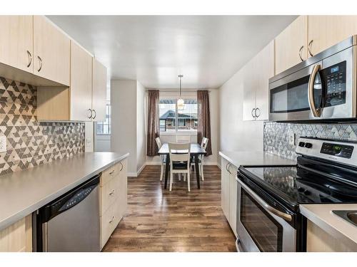 57-4769 Hubalta Road Se, Calgary, AB - Indoor Photo Showing Kitchen