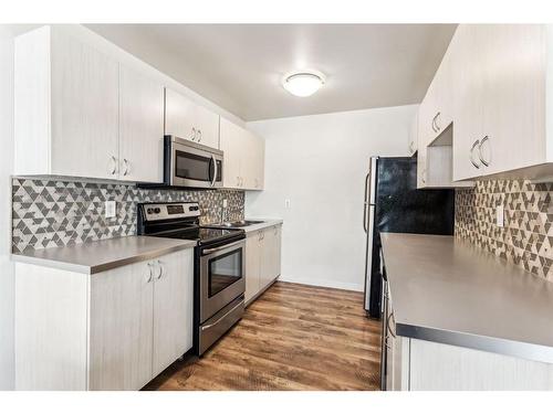 57-4769 Hubalta Road Se, Calgary, AB - Indoor Photo Showing Kitchen