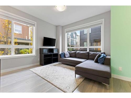 614 Redstone Crescent Ne, Calgary, AB - Indoor Photo Showing Living Room