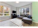 614 Redstone Crescent Ne, Calgary, AB  - Indoor Photo Showing Living Room 