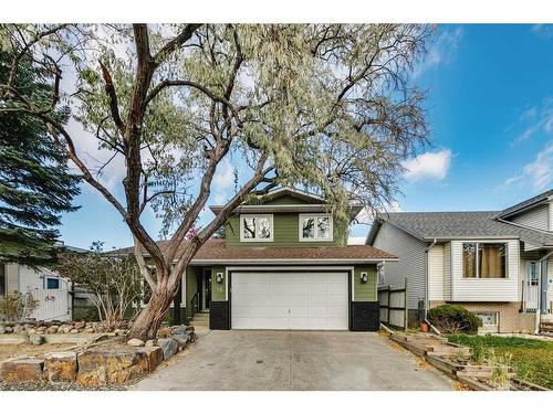 35 Mckinley Road Se, Calgary, AB - Outdoor With Facade