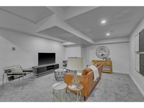 35 Mckinley Road Se, Calgary, AB - Indoor With Fireplace