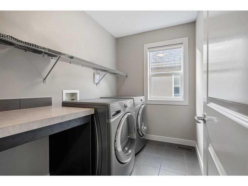 34 Cranarch Circle Se, Calgary, AB - Indoor Photo Showing Laundry Room