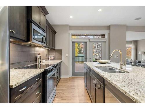 34 Cranarch Circle Se, Calgary, AB - Indoor Photo Showing Kitchen With Double Sink With Upgraded Kitchen