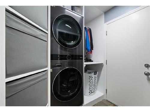 16 Everwoods Road Sw, Calgary, AB - Indoor Photo Showing Laundry Room